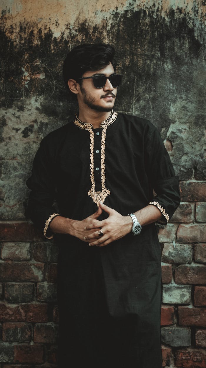 Crafting Captivating Headlines: Your awesome post title goes here Stylish portrait of an adult man wearing a traditional kurta and sunglasses, exuding confidence and modern fashion sense.
